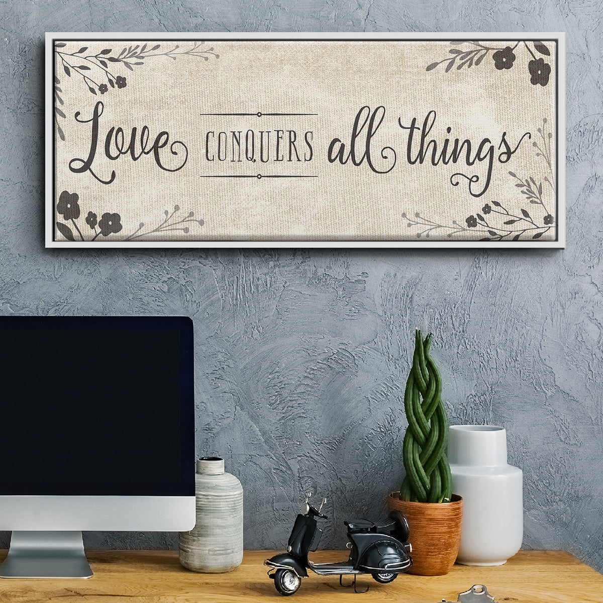Love Conquers - Floater Framed Canvas Print