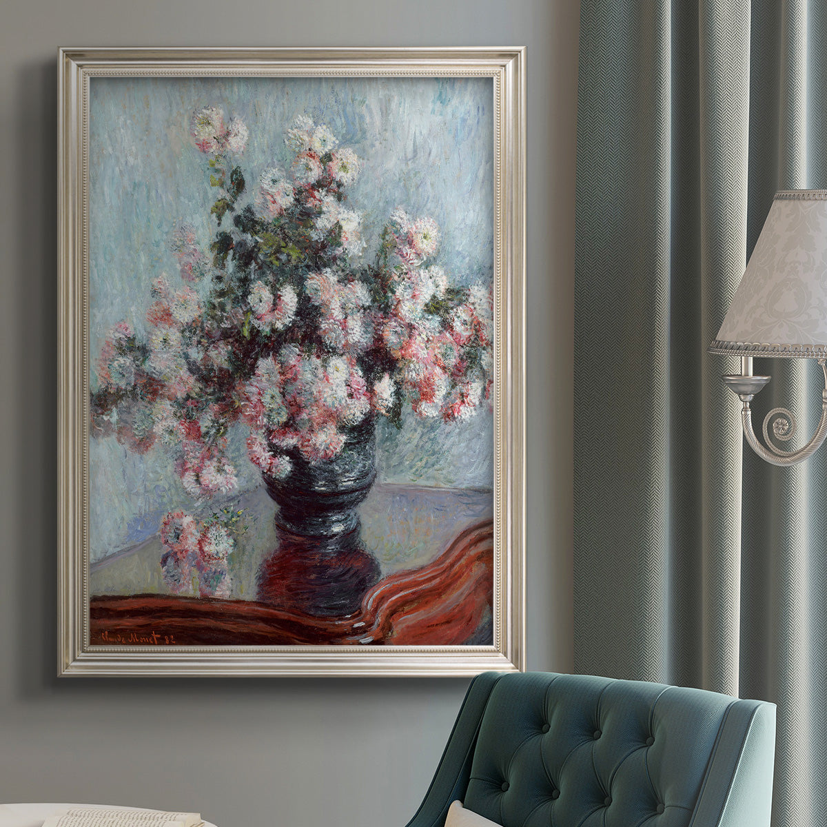 Impressionist chrysanthemum floral painting by Claude Monet in an {frame_style_descriptor} displayed in a neutral interior setting.