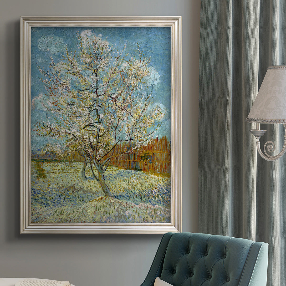Impressionist spring landscape with a blooming peach tree by Vincent van Gogh in an {frame_style_descriptor} displayed in a neutral interior setting.