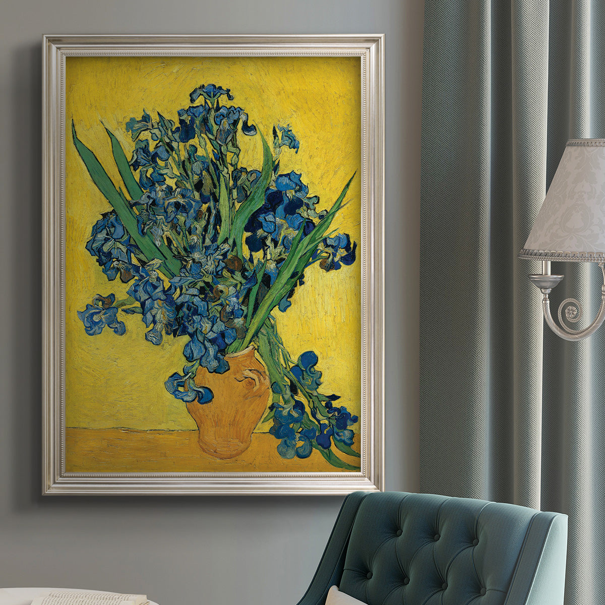 Impressionist iris flower painting by Vincent van Gogh in an {frame_style_descriptor} displayed in a neutral interior setting.