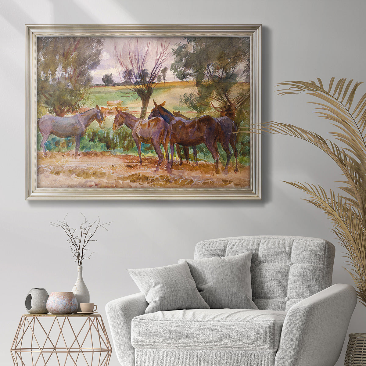 Impressionist animal study of mules by John Singer Sargent in an ornate champagne frame displayed in a bright interior setting.
