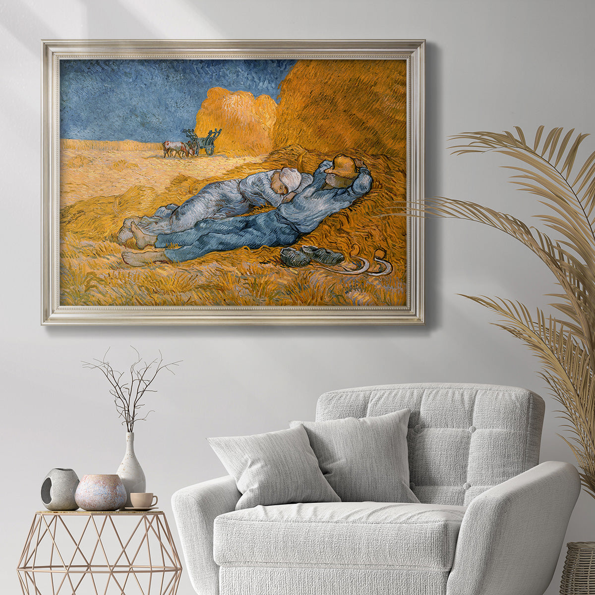 Iconic impressionist resting figures scene by Vincent van Gogh in an ornate champagne frame displayed in a bright interior setting.