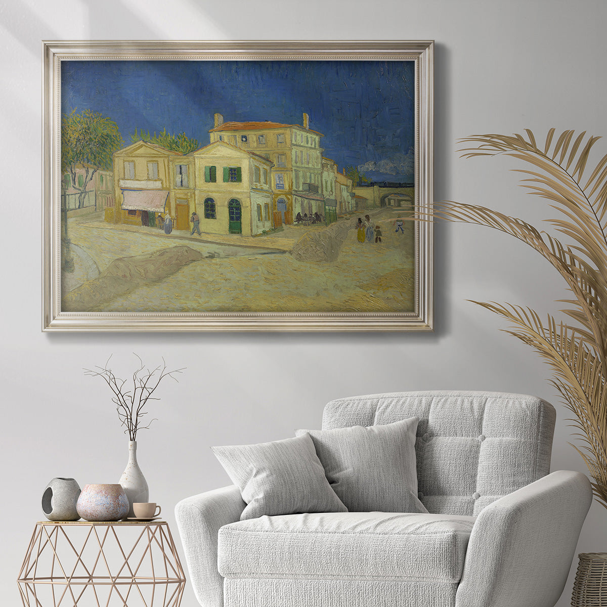 Impressionist depiction of the Yellow House in Arles by Vincent van Gogh in an ornate champagne frame displayed in a bright interior setting.