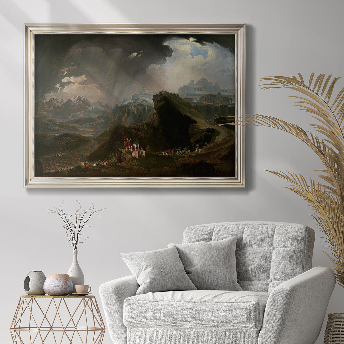 Dramatic biblical landscape painting by John Martin in an ornate champagne frame displayed in a bright interior setting.