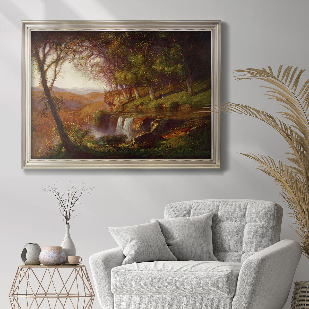Romantic spring landscape painting by Samuel Colman in an ornate champagne frame displayed in a bright interior setting.