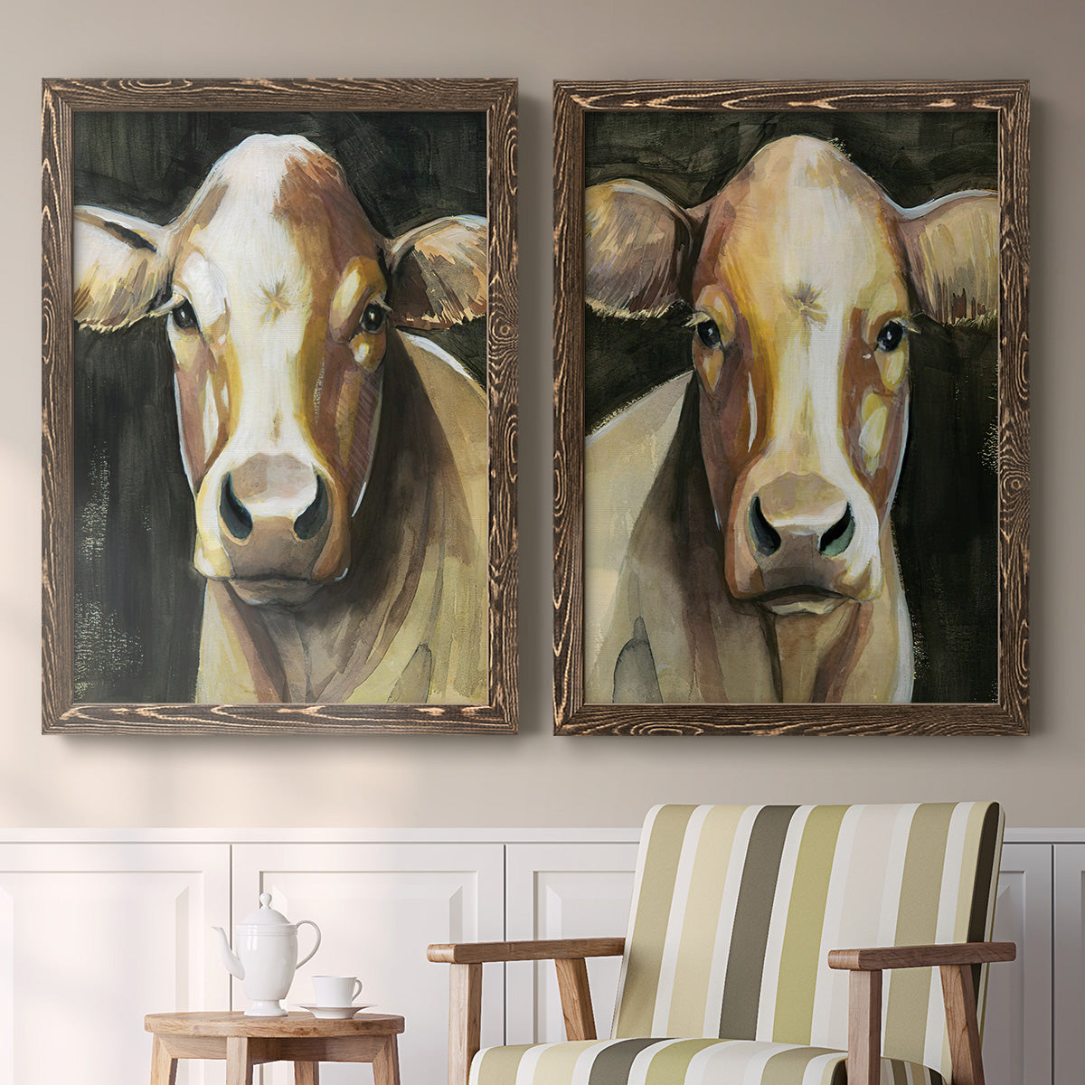 Set of two walnut barnwood framed canvas prints depicting two painterly farm-animal portraits featuring close-up portraits of gentle brown cows above a sideboard in a cozy sitting room.