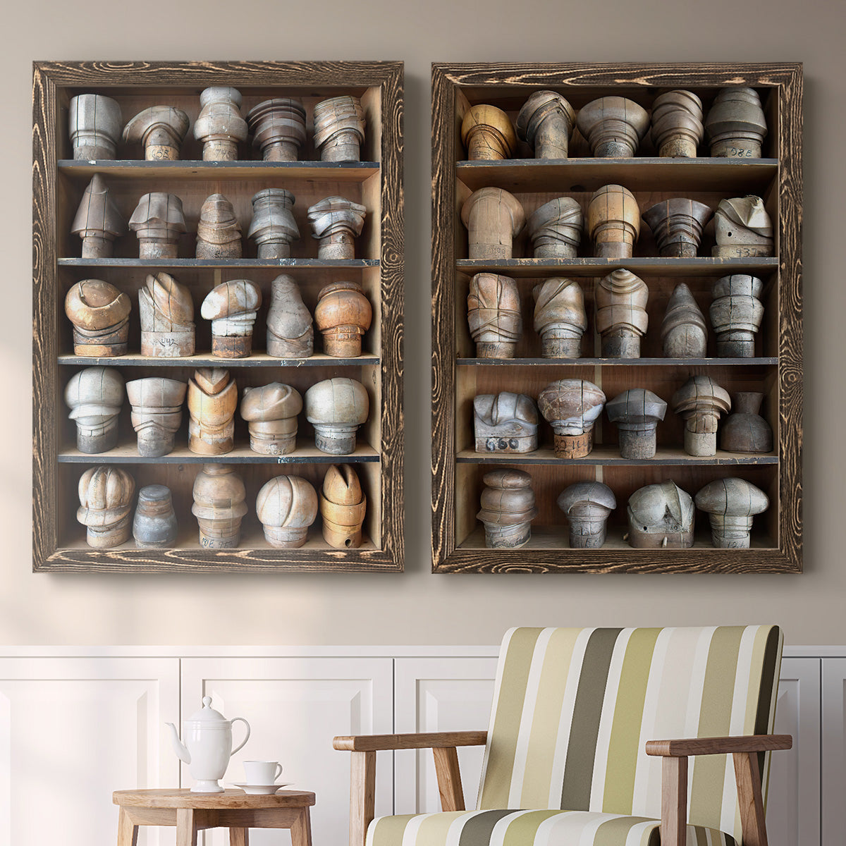 Set of two walnut barnwood framed canvas prints depicting two fashion-object photography featuring shelves filled with wooden hat forms above a sideboard in a cozy sitting room.
