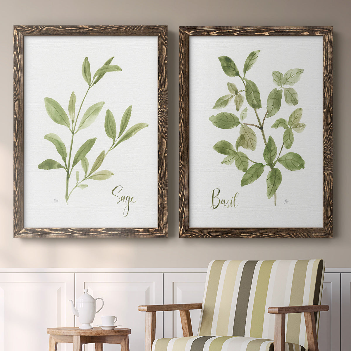 Set of two walnut barnwood framed canvas prints depicting two farmhouse herb illustrations featuring culinary sage and basil sprigs with handwritten labels above a sideboard in a cozy sitting room.