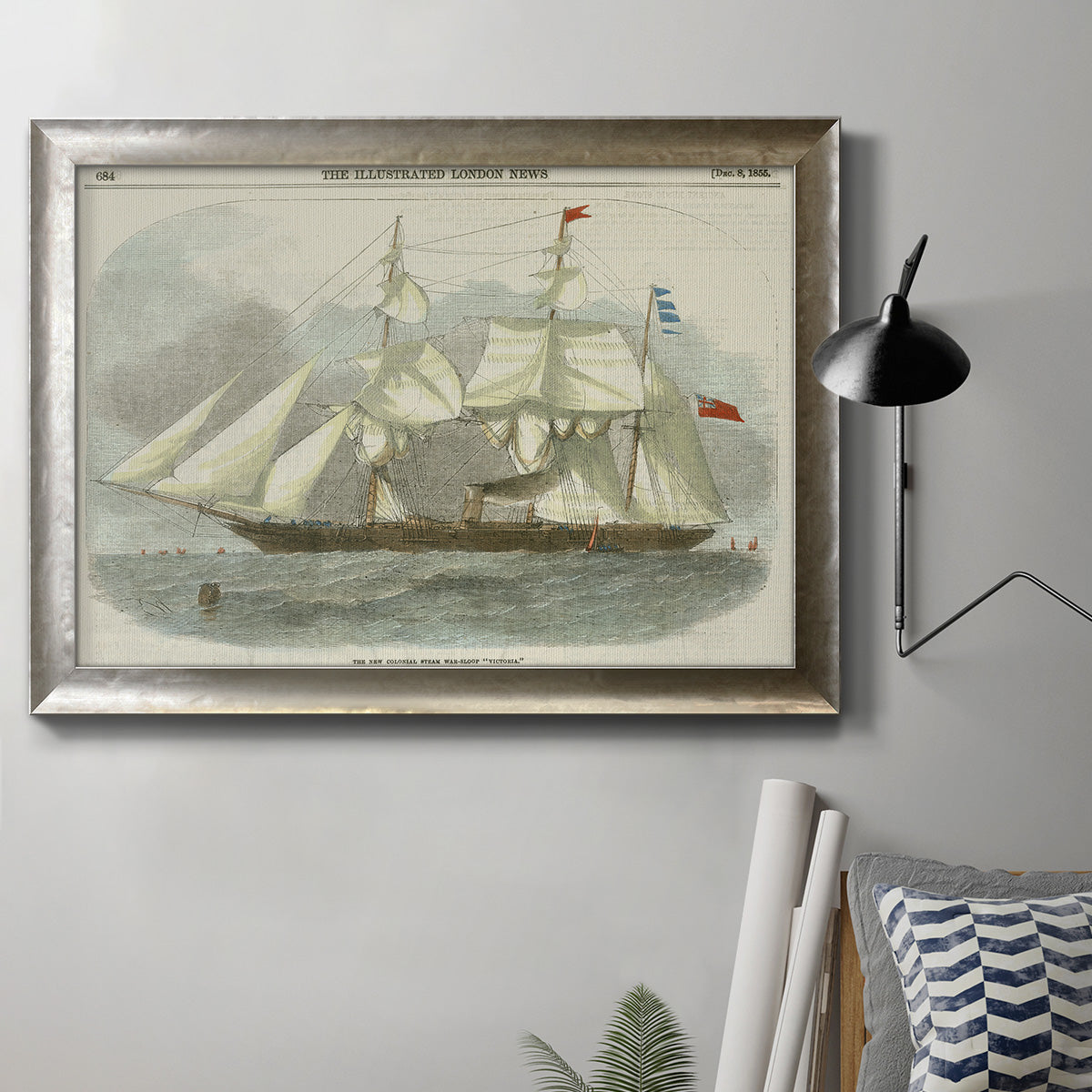 Antique nautical clipper ship drawing in an ornate mottled silver frame displayed in a neutral interior setting.