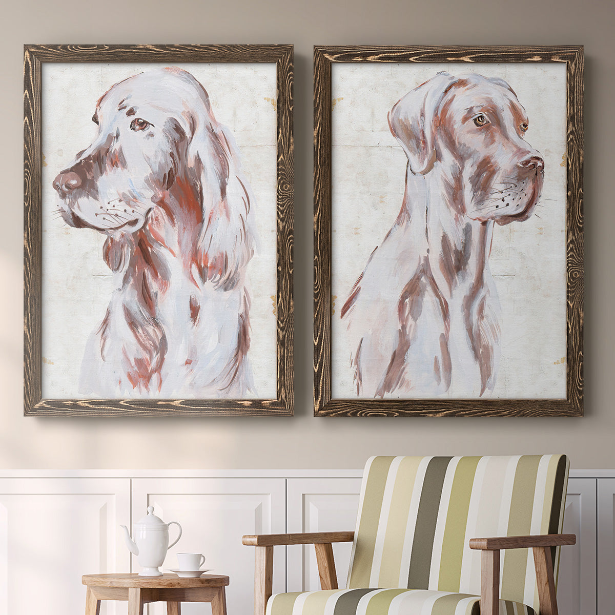 Set of two walnut barnwood framed canvas prints depicting two traditional watercolor pet paintings featuring gentle seated dog portraits above a sideboard in a cozy sitting room.