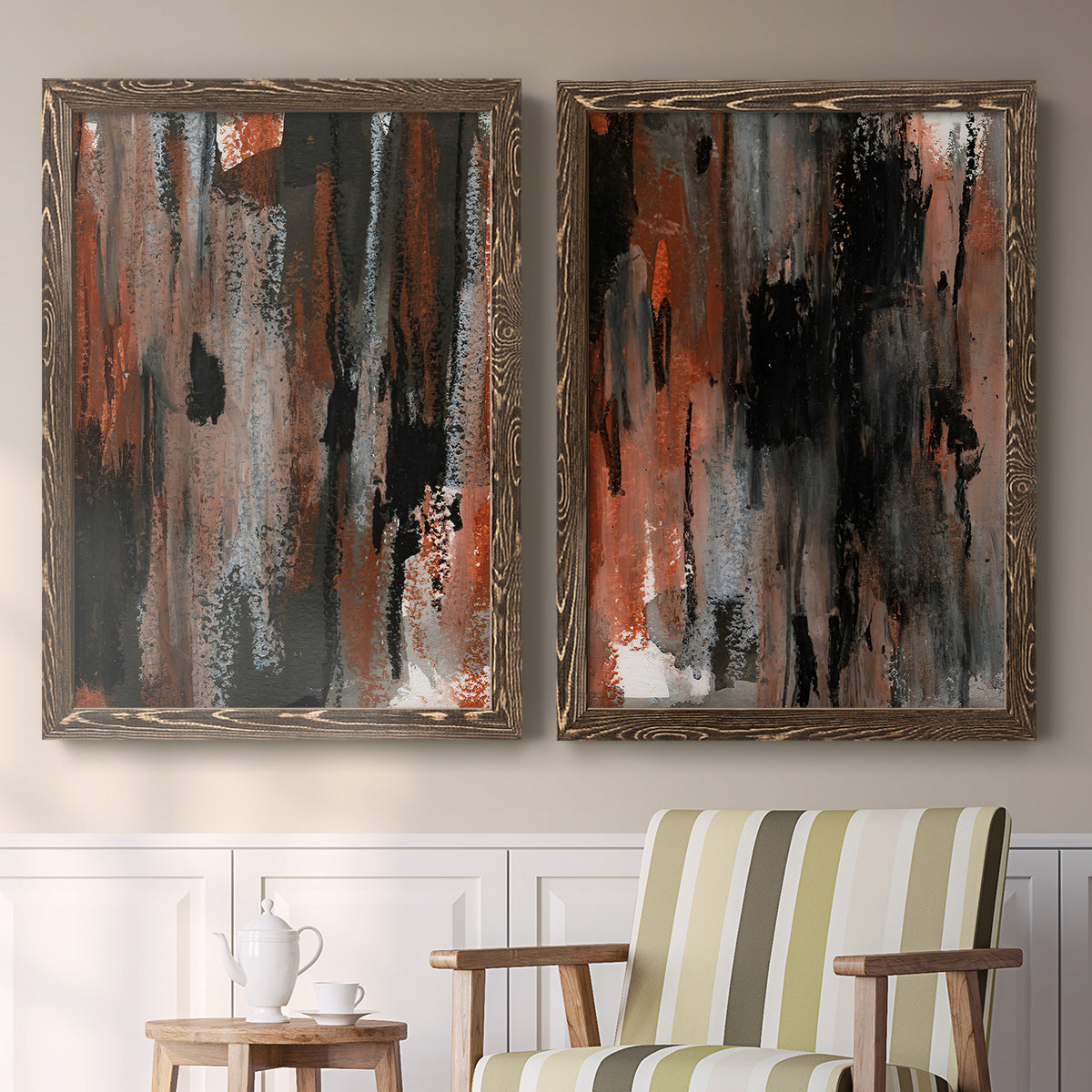 Set of two walnut barnwood framed canvas prints depicting two urban mixed-media abstracts featuring vertical abstract brush bands in changing muted palettes above a sideboard in a cozy sitting room.