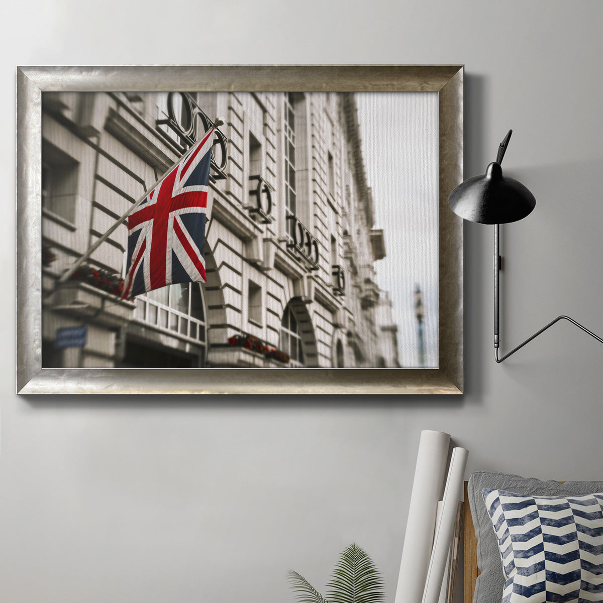 Urban monochrome London cityscape photography in an ornate mottled silver frame displayed in a neutral interior setting.