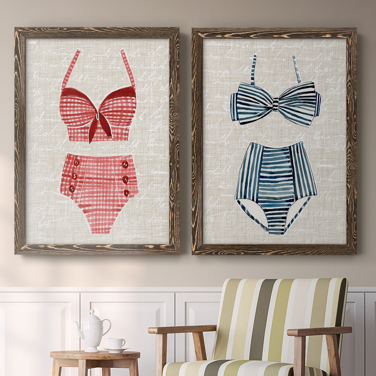 Set of two walnut barnwood framed canvas prints depicting two vintage fashion illustrations featuring retro two-piece swimsuits displayed on textured linen grounds above a sideboard in a cozy sitting room.