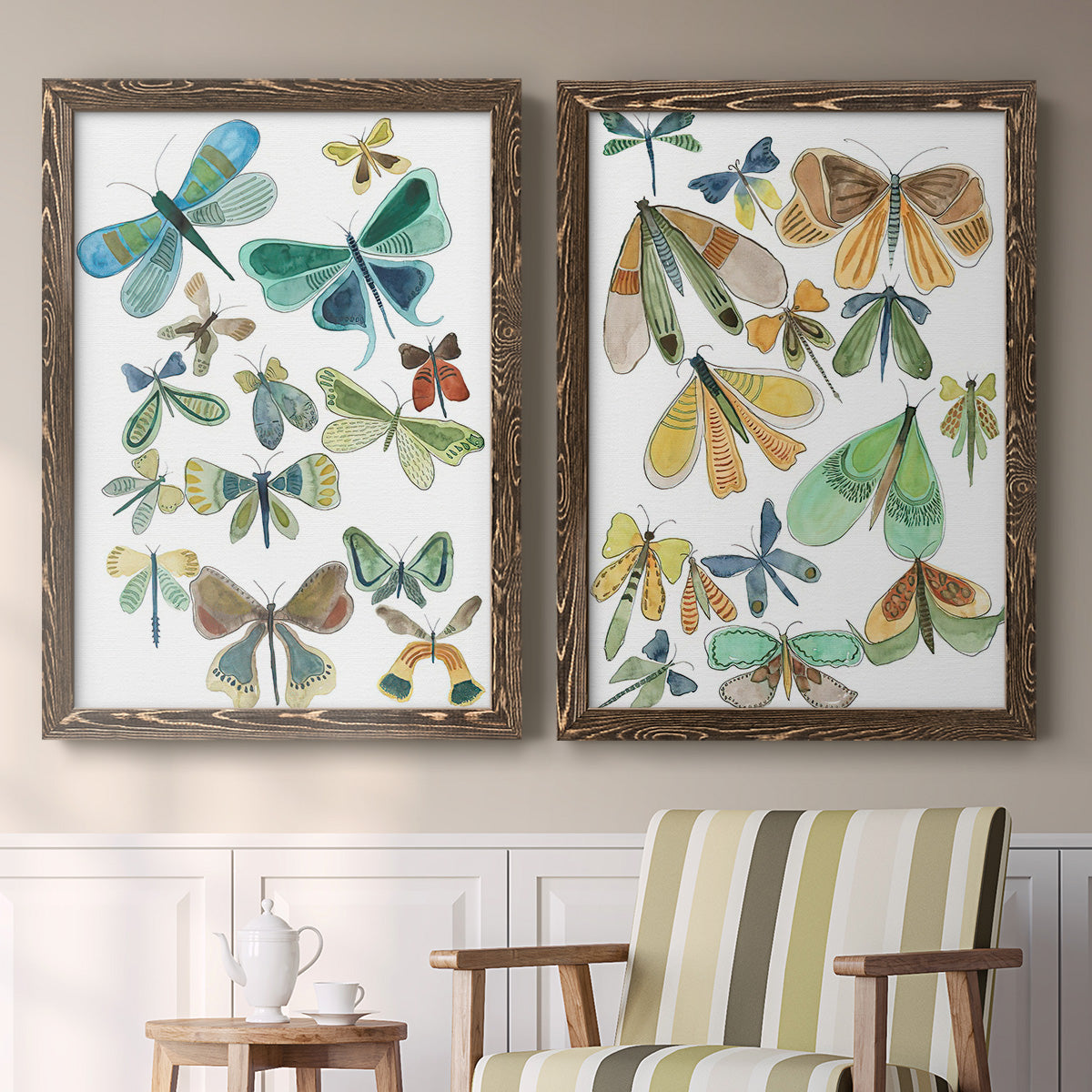 Set of two walnut barnwood framed canvas prints depicting two decorative insect illustrations featuring collections of moths and butterflies above a sideboard in a cozy sitting room.