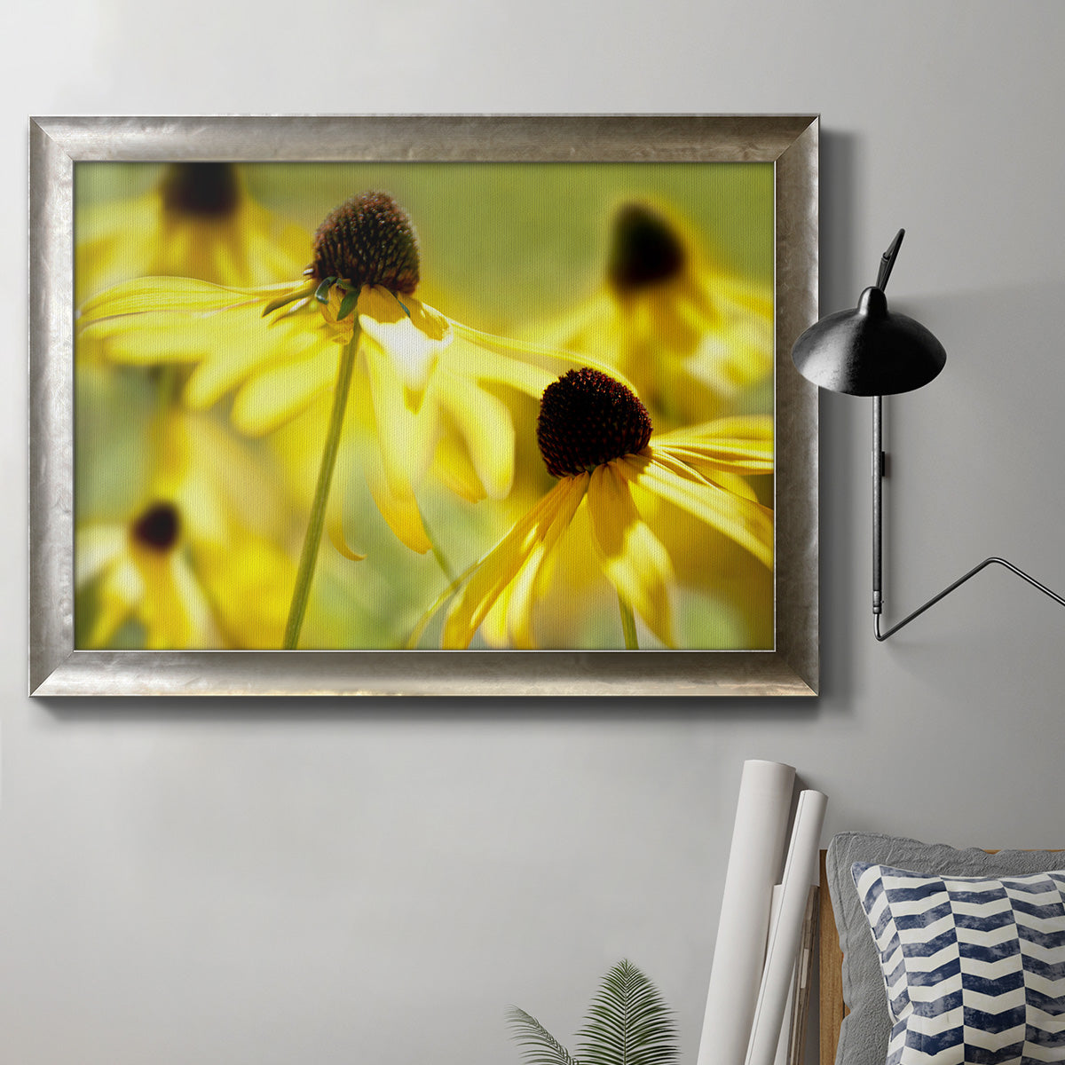 Modern floral Susan flower photography in an ornate mottled silver frame displayed in a neutral interior setting.
