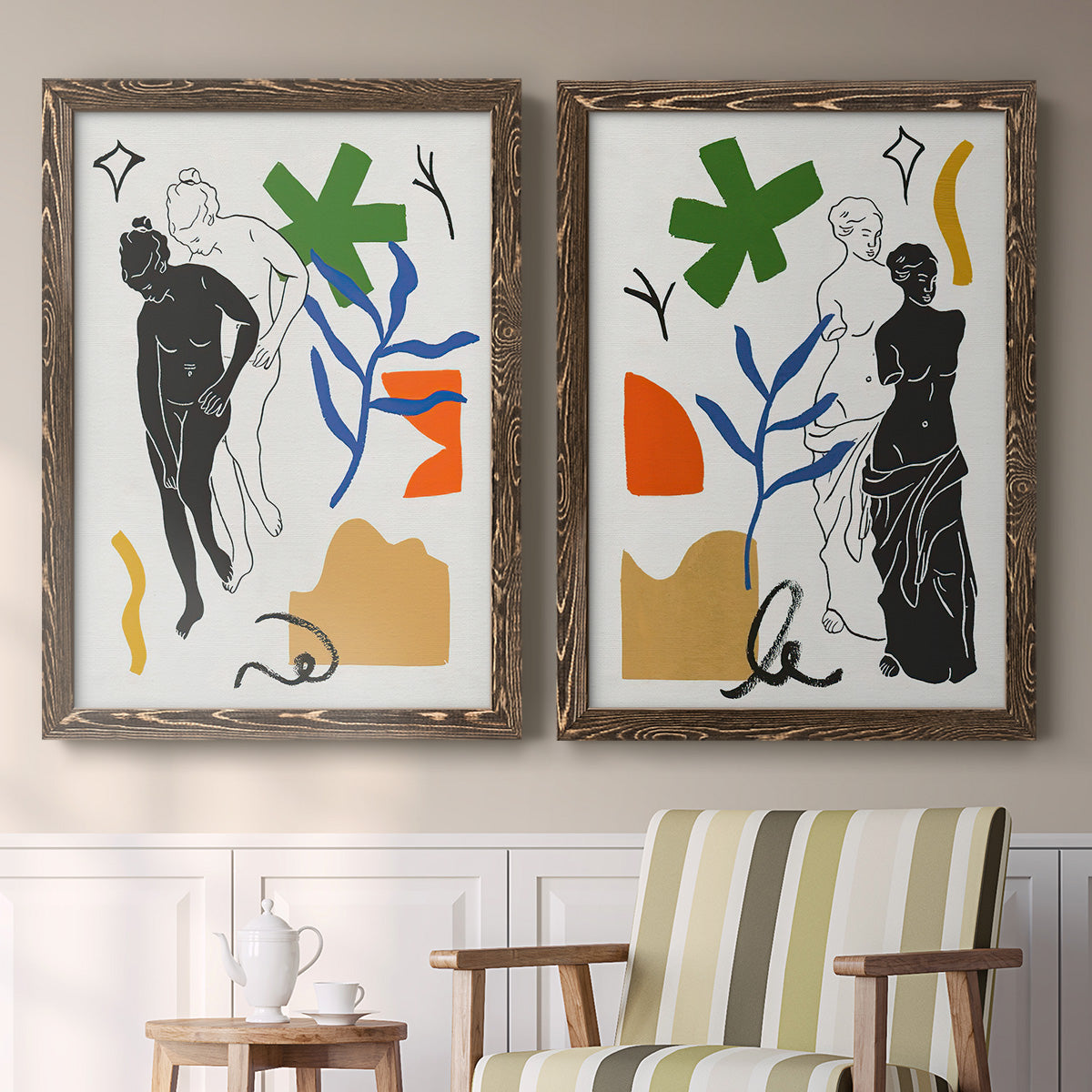 Set of two walnut barnwood framed canvas prints depicting two graphic figurative collages featuring stylized female figures surrounded by botanical and geometric symbols above a sideboard in a cozy sitting room.