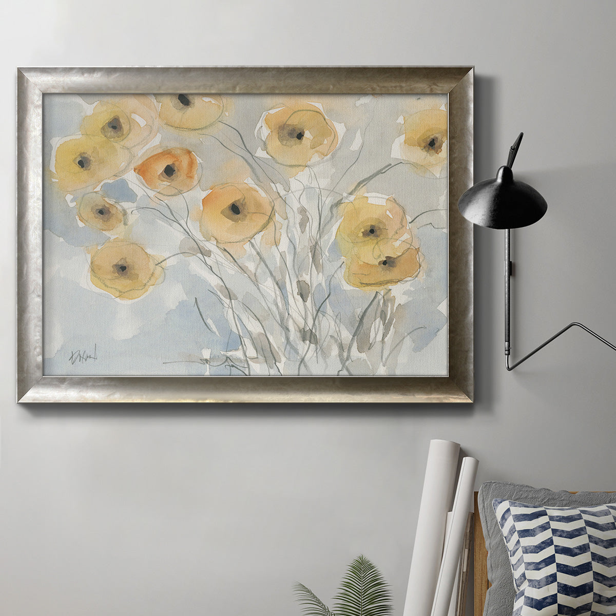 Impressionist poppy floral watercolor painting in an ornate mottled silver frame displayed in a neutral interior setting.