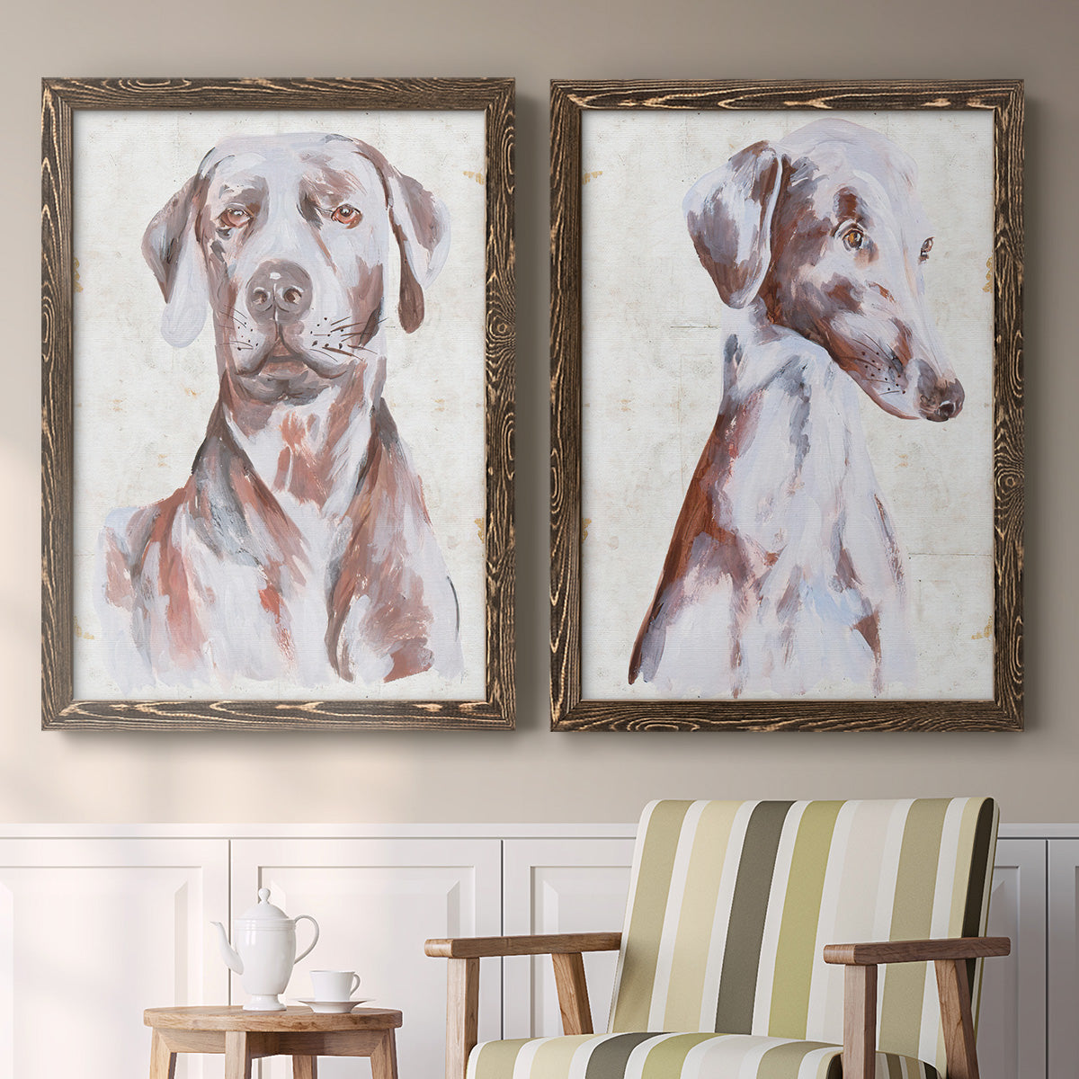 Set of two walnut barnwood framed canvas prints depicting two traditional watercolor pet paintings featuring gentle seated dog portraits above a sideboard in a cozy sitting room.
