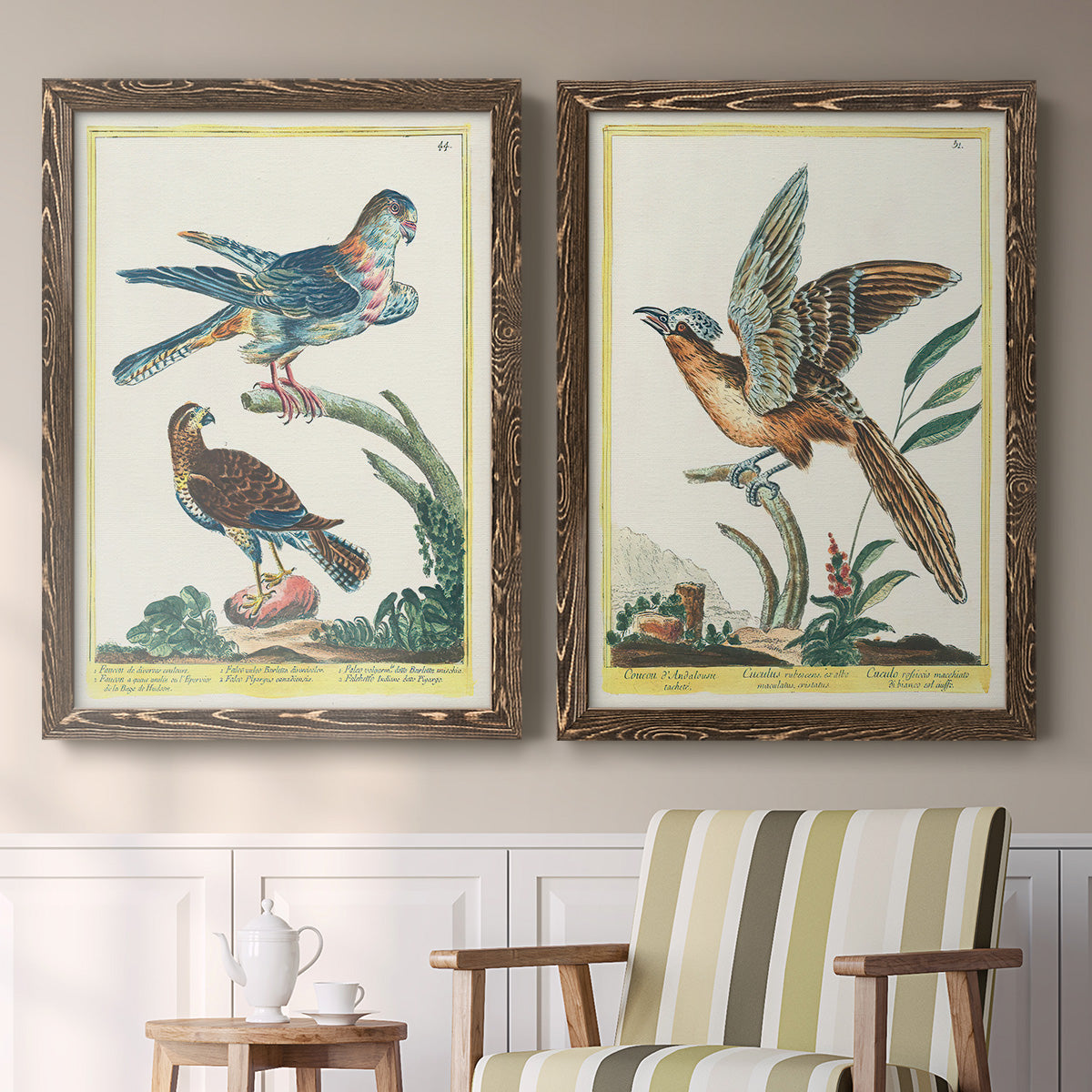 Set of two walnut barnwood framed canvas prints depicting two atmospheric abstract paintings featuring misty blue gray and violet marks hovering across pale grounds above a sideboard in a cozy sitting room.