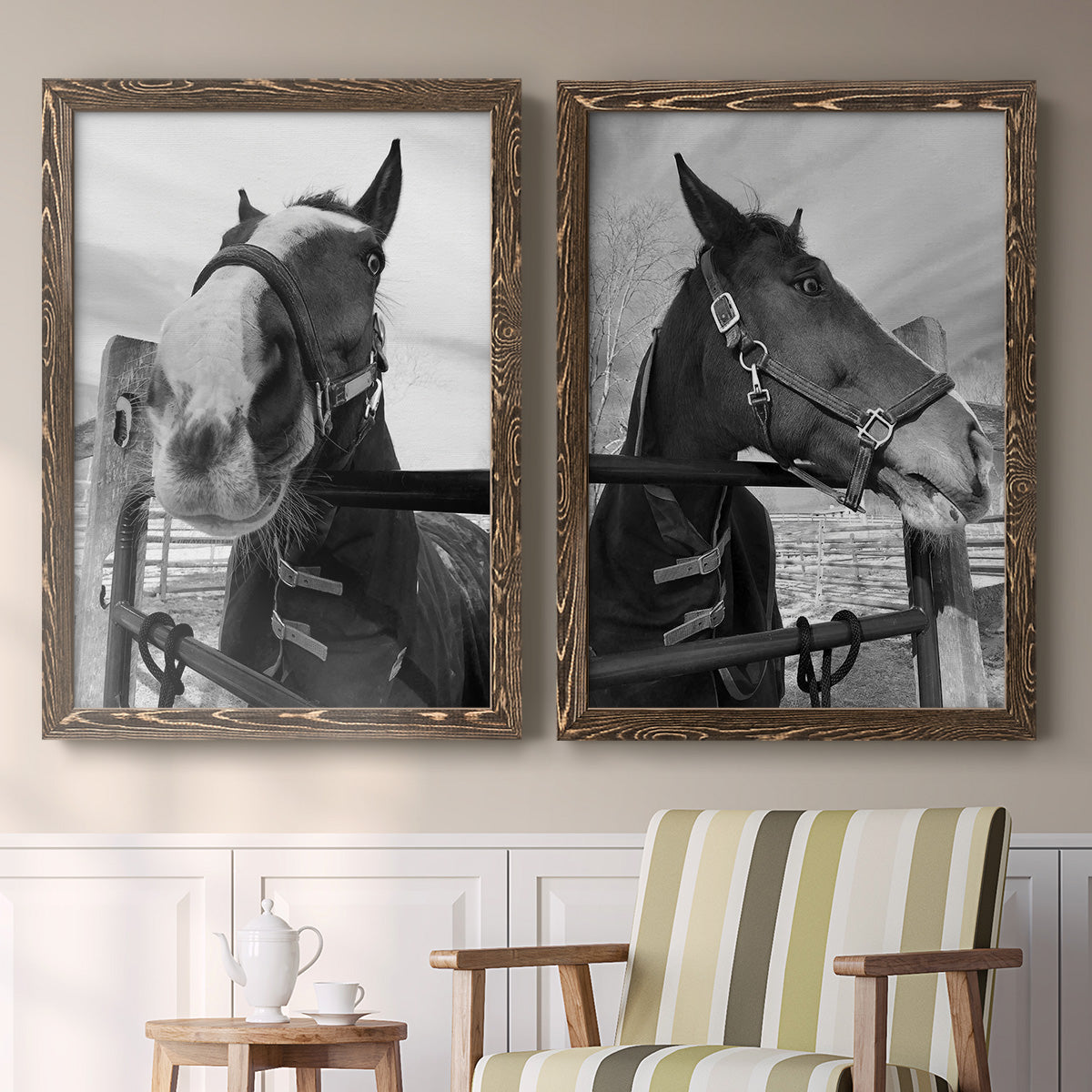 Set of two walnut barnwood framed canvas prints depicting two modern equestrian photography featuring black-and-white close-up portraits of horses at fences above a sideboard in a cozy sitting room.