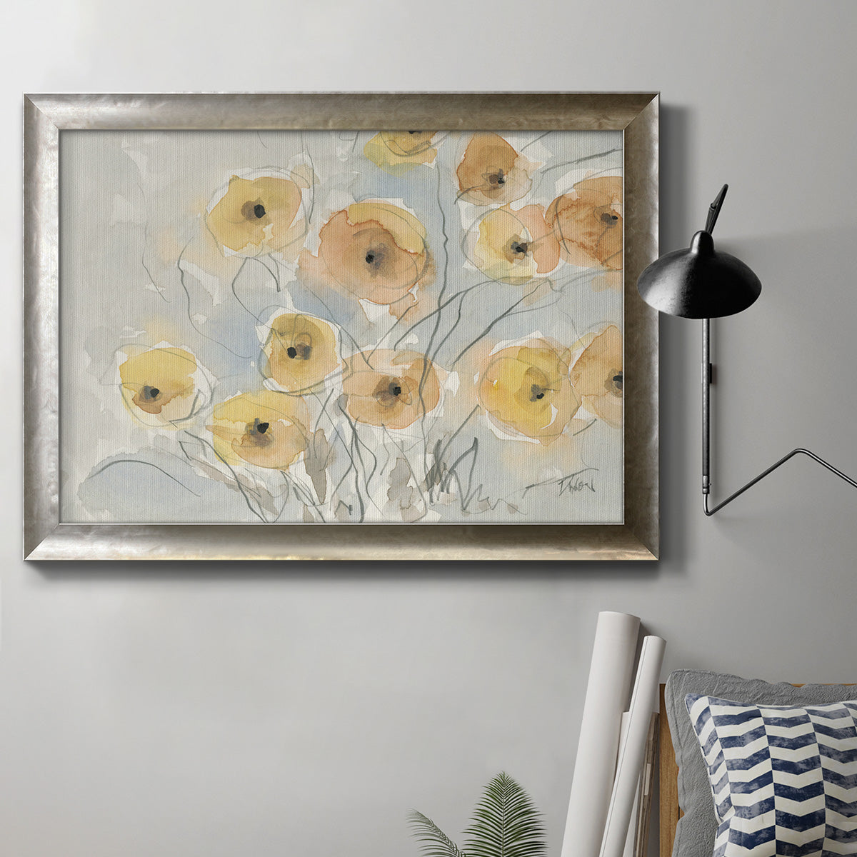 Minimalist poppy flower watercolor artwork in an ornate mottled silver frame displayed in a neutral interior setting.