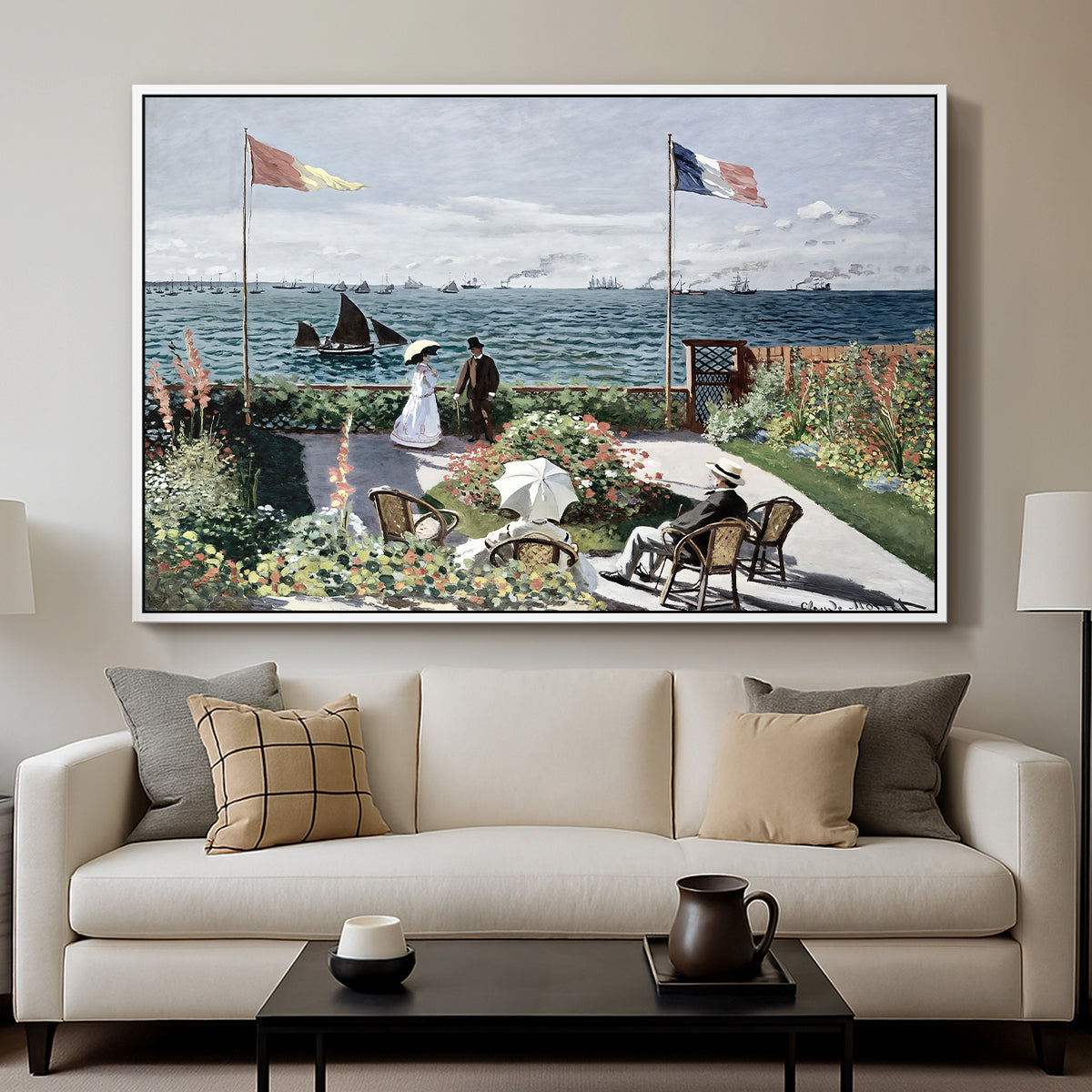 Garden at Sainte-Adresse, 1867 by Claude Monet displayed in a white floater framed canvas above a sofa in a clean living room.