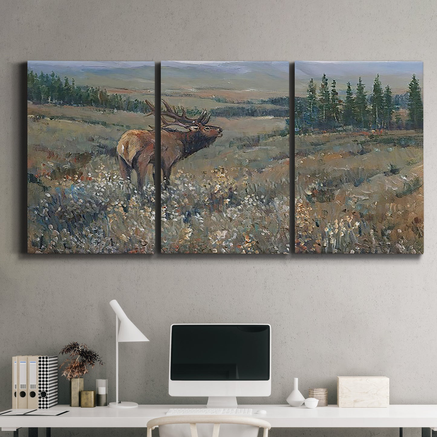 Three-panel canvas wall art featuring western wildlife grazing in open field, displayed above a desk in a home office.