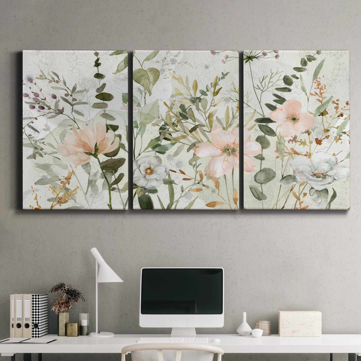 Three-panel canvas wall art featuring vintage floral botanical sketchbook, displayed above a desk in a home office.