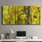Three-panel canvas wall art featuring backlit aspen trees photograph, displayed above a desk in a home office.