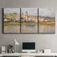 Three-panel canvas wall art featuring village overlooking river valley, displayed above a desk in a home office.