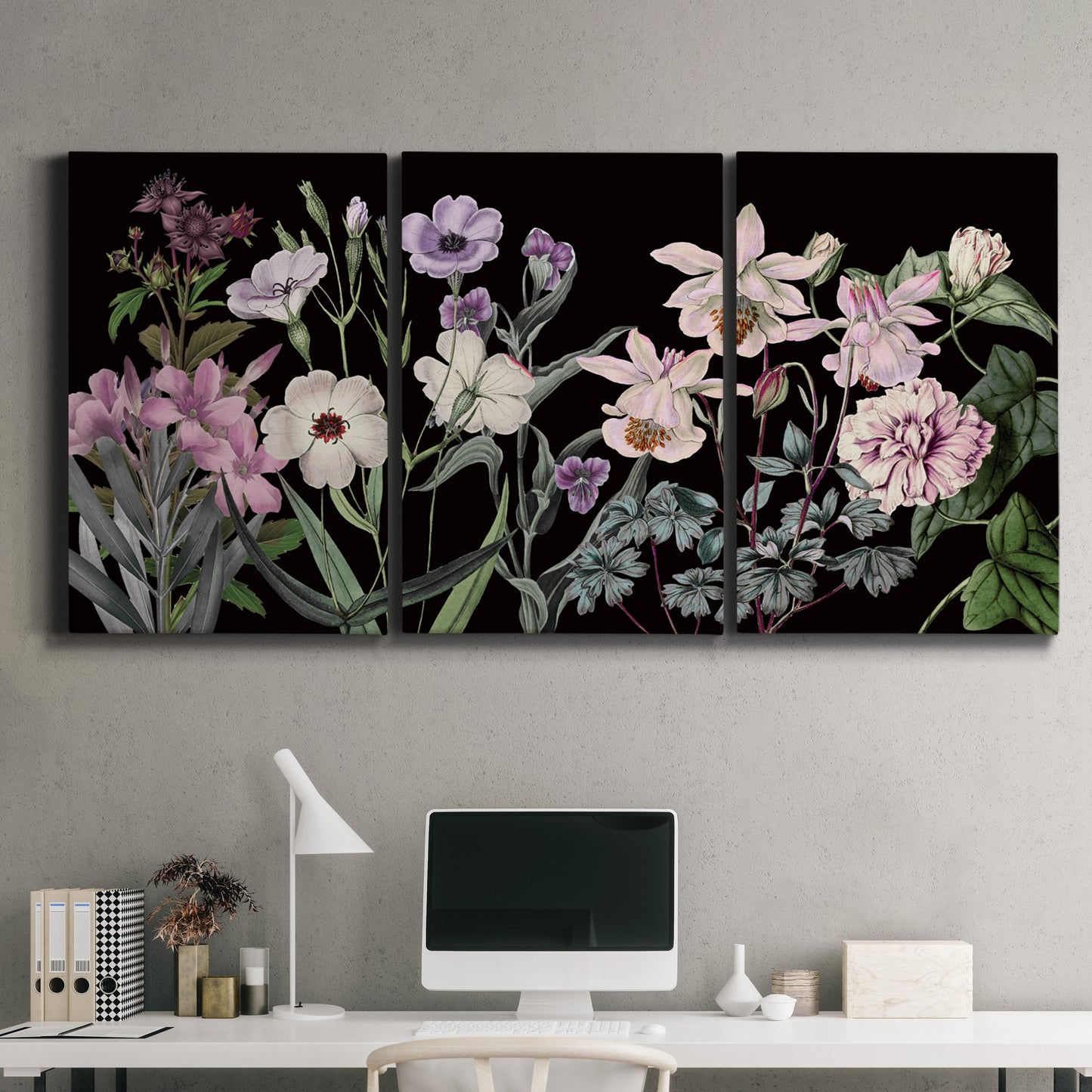 Three-panel canvas wall art featuring early spring blossoms in soft tones, displayed above a desk in a home office.