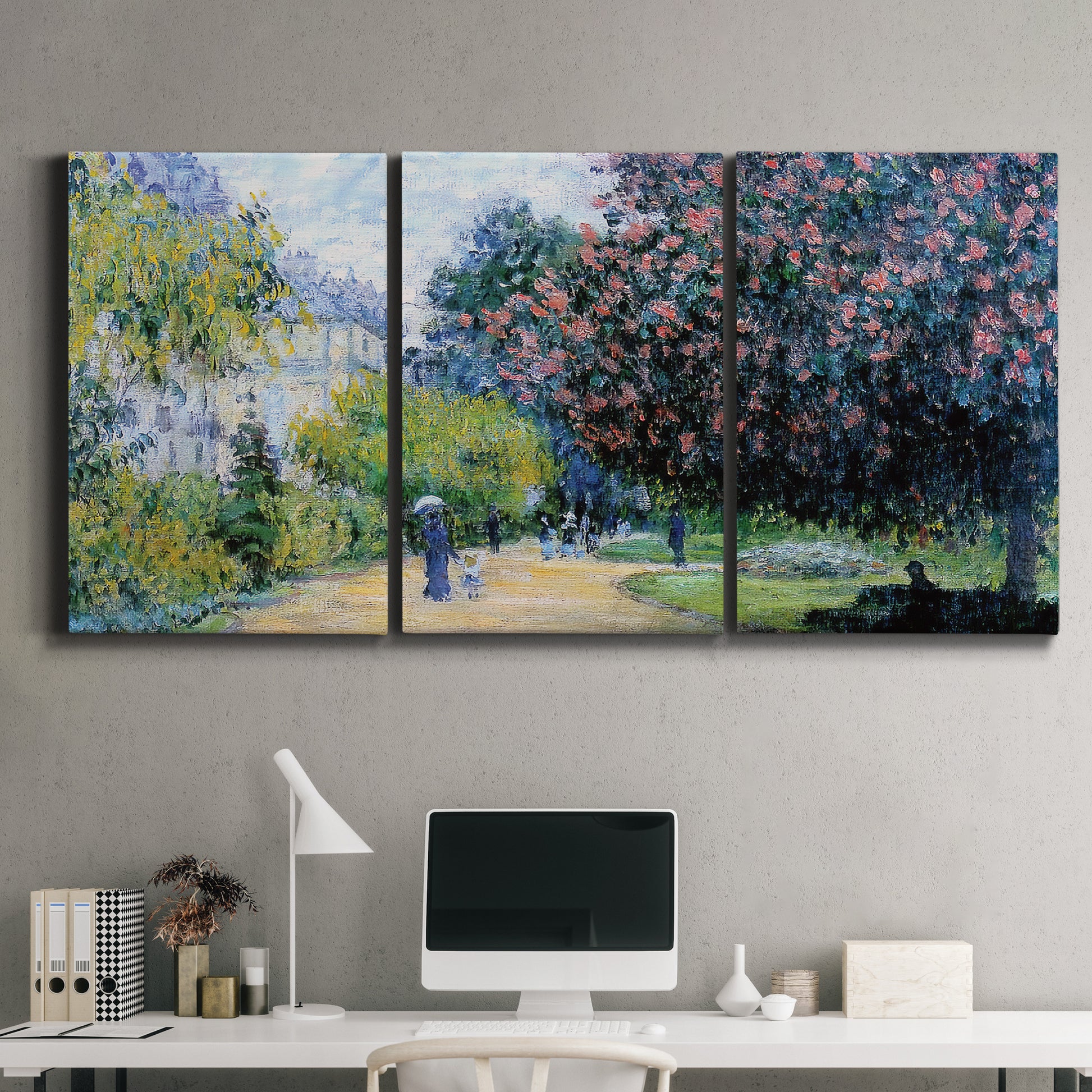 Three-panel canvas wall art featuring formal city park with trees, displayed above a desk in a home office.