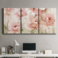 Three-panel canvas wall art featuring spring floral blossoms in bloom, displayed above a desk in a home office.
