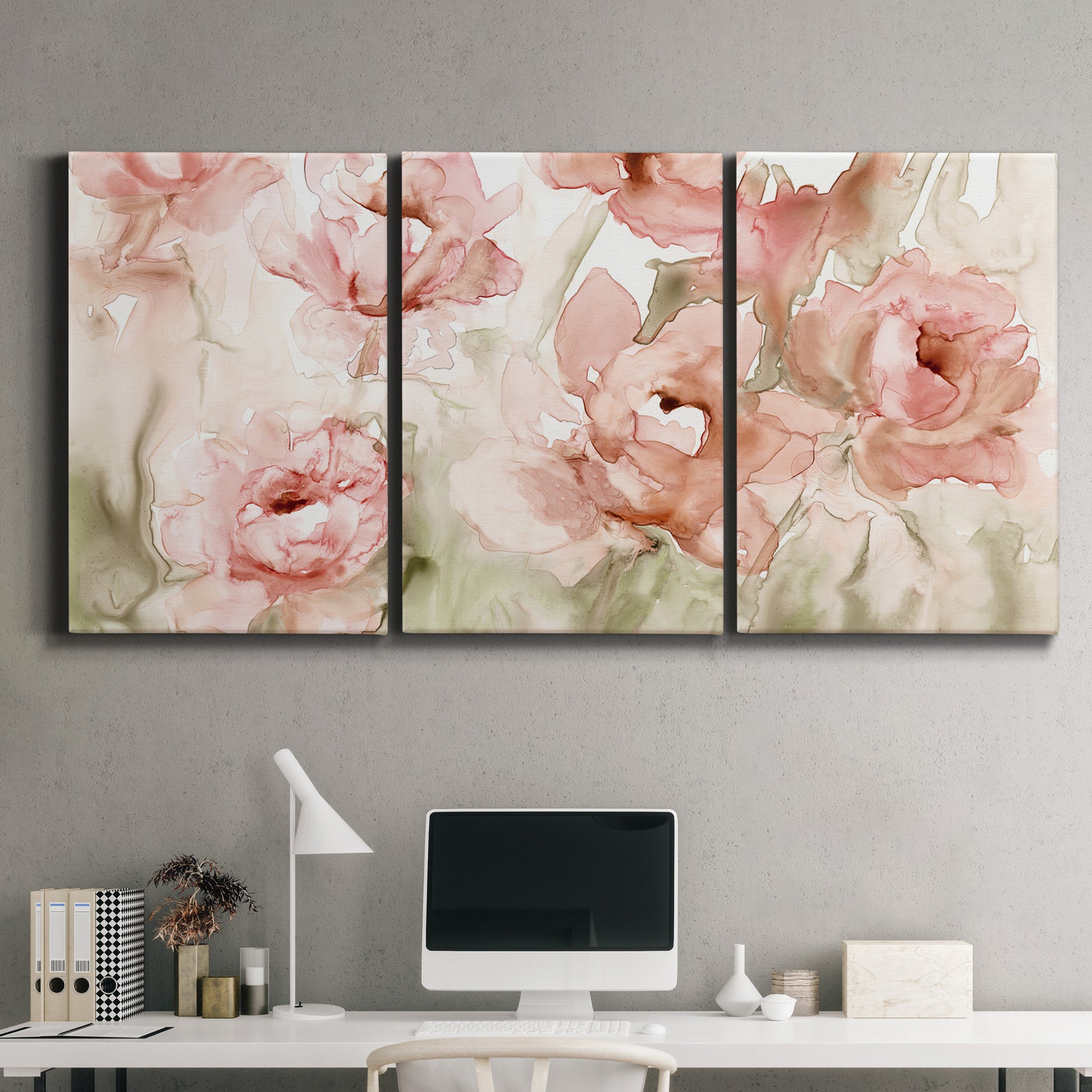 Three-panel canvas wall art featuring spring floral blossoms in bloom, displayed above a desk in a home office.