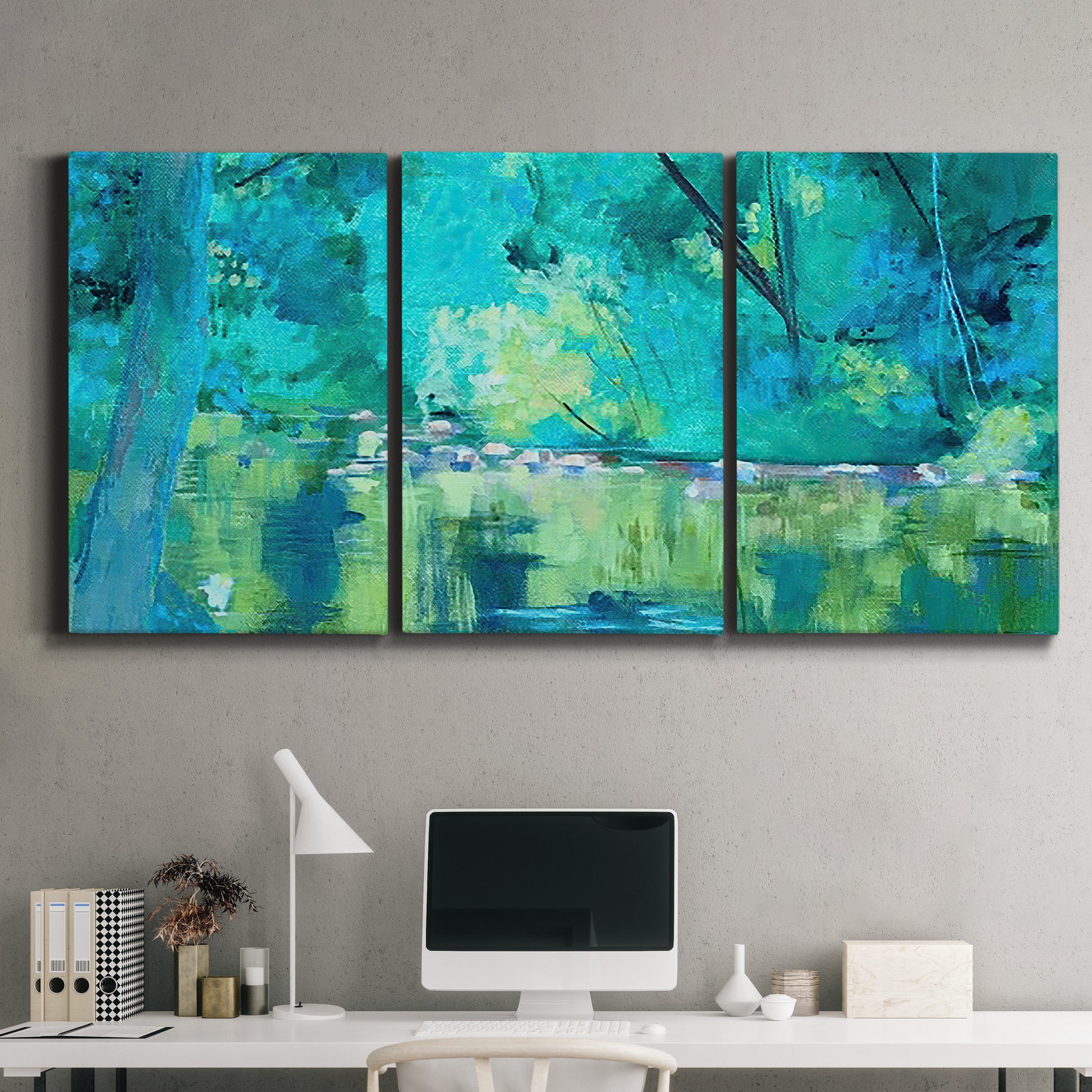 Three-panel canvas wall art featuring abstract river composition with movement, displayed above a desk in a home office.