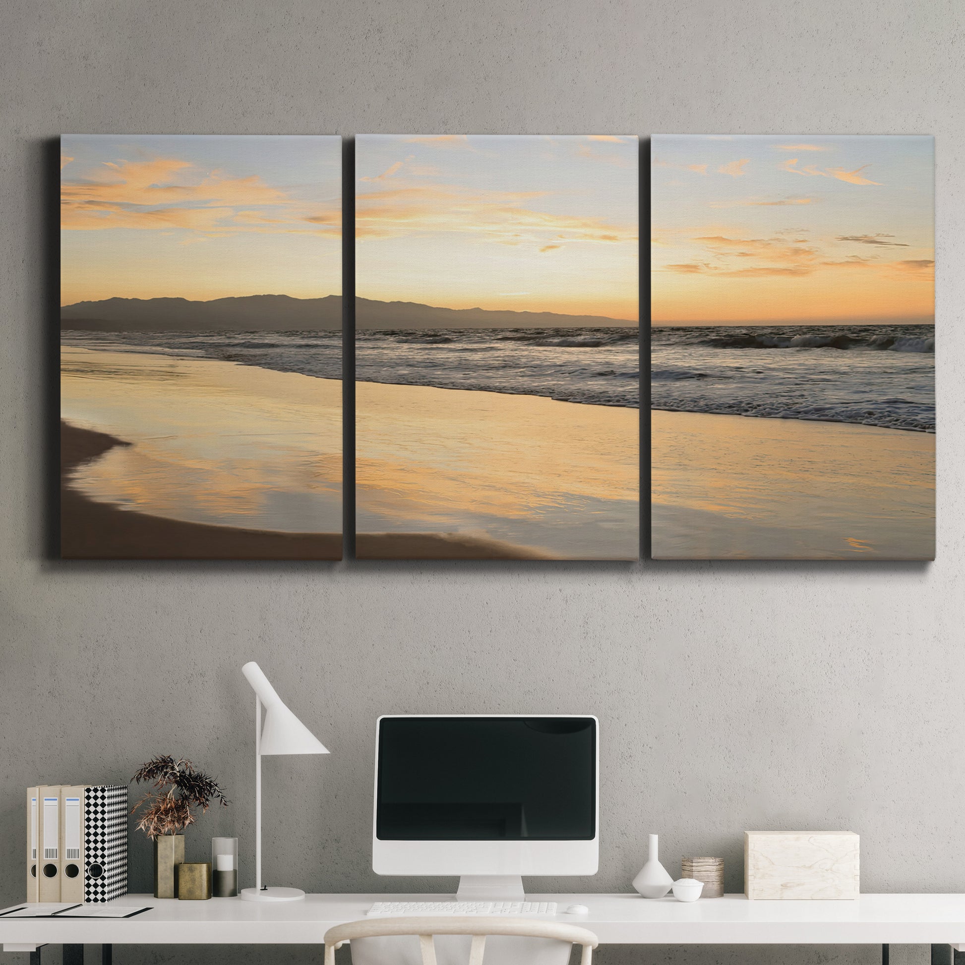 Three-panel canvas wall art featuring quiet tropical shoreline at low tide, displayed above a desk in a home office.