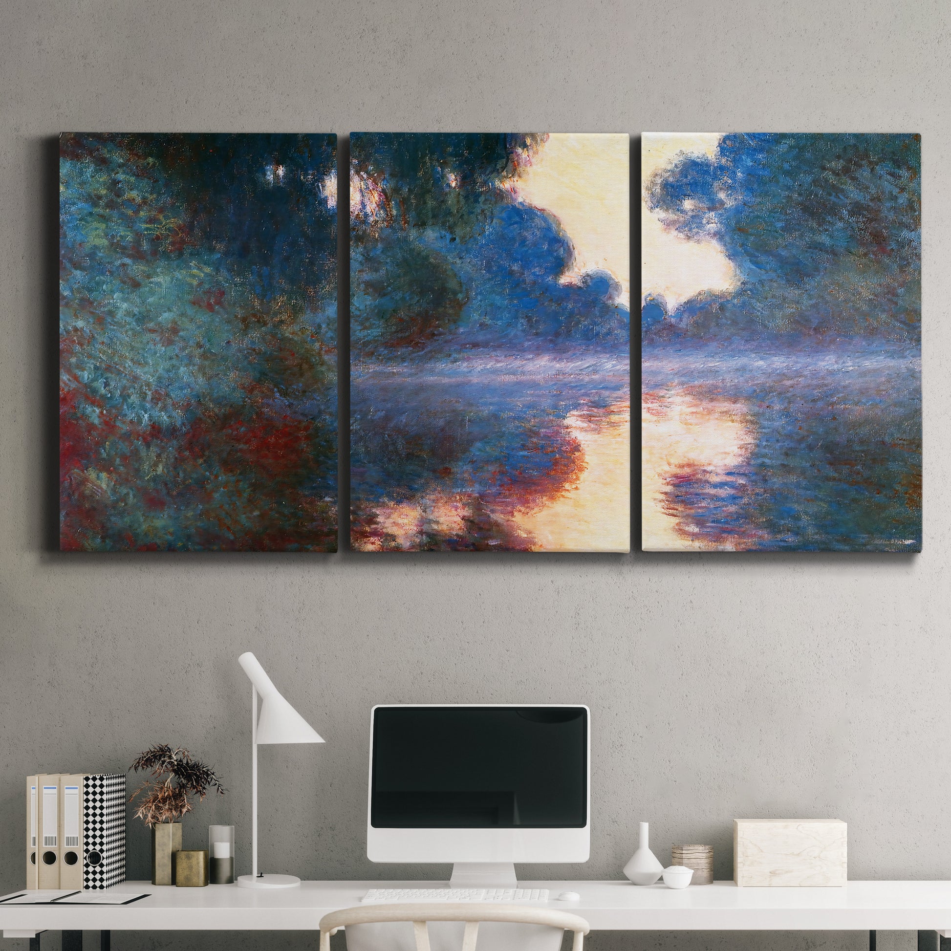 Three-panel canvas wall art featuring misty river surface at dawn, displayed above a desk in a home office.