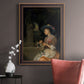 Classical interior scene of a woman weaving flowers by Godfried Schalcken in an ornate bronzed mahogany wood frame displayed in a neutral interior setting.