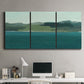 Three-panel canvas wall art featuring calm lake water under open sky, displayed above a desk in a home office.
