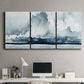 Three-panel canvas wall art featuring abstract rainstorm watercolor, displayed above a desk in a home office.