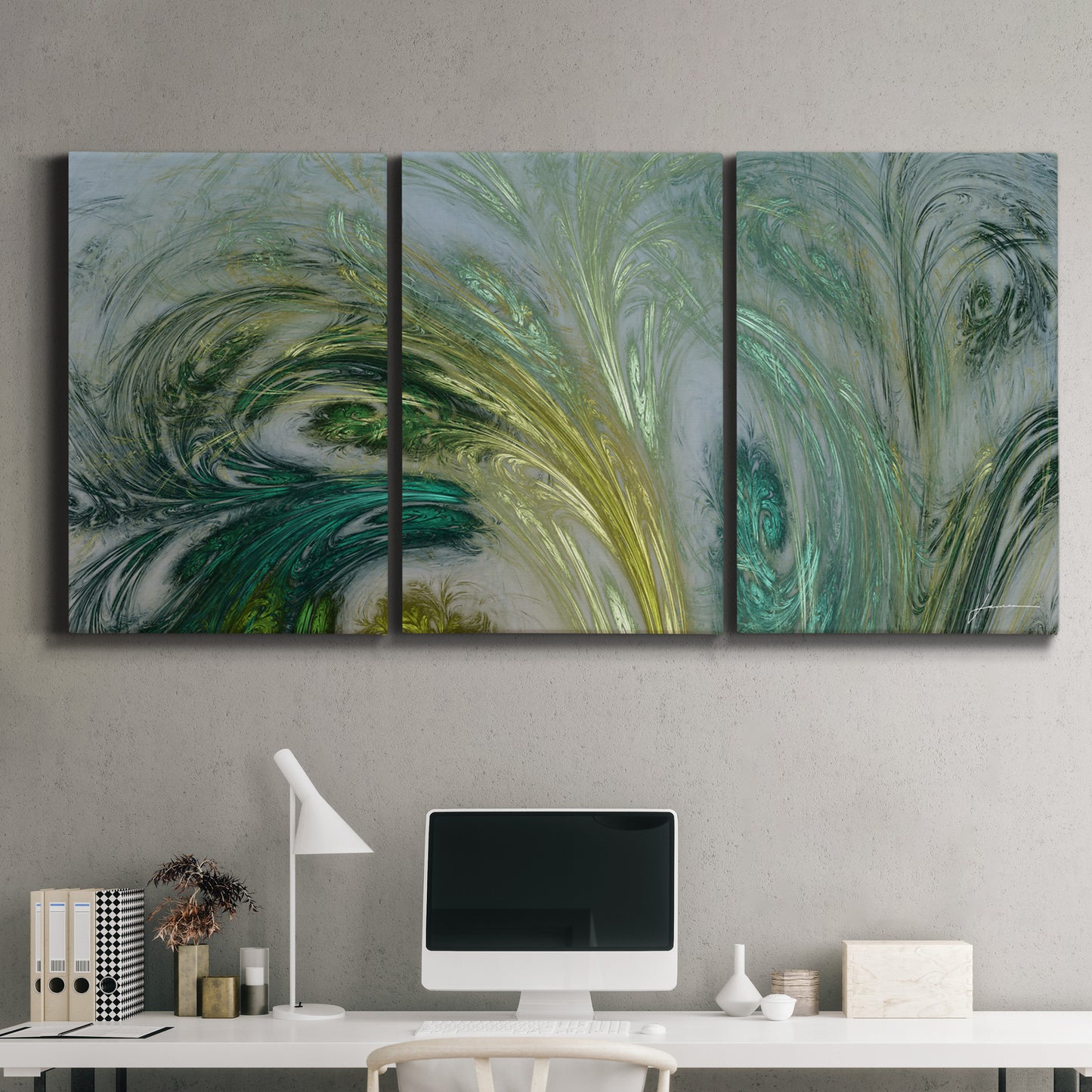 Three-panel canvas wall art featuring layered modern abstract landscape, displayed above a desk in a home office.