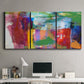 Three-panel canvas wall art featuring vibrant abstract color field panels, displayed above a desk in a home office.