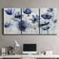 Three-panel canvas wall art featuring indigo floral blossoms awakening, displayed above a desk in a home office.