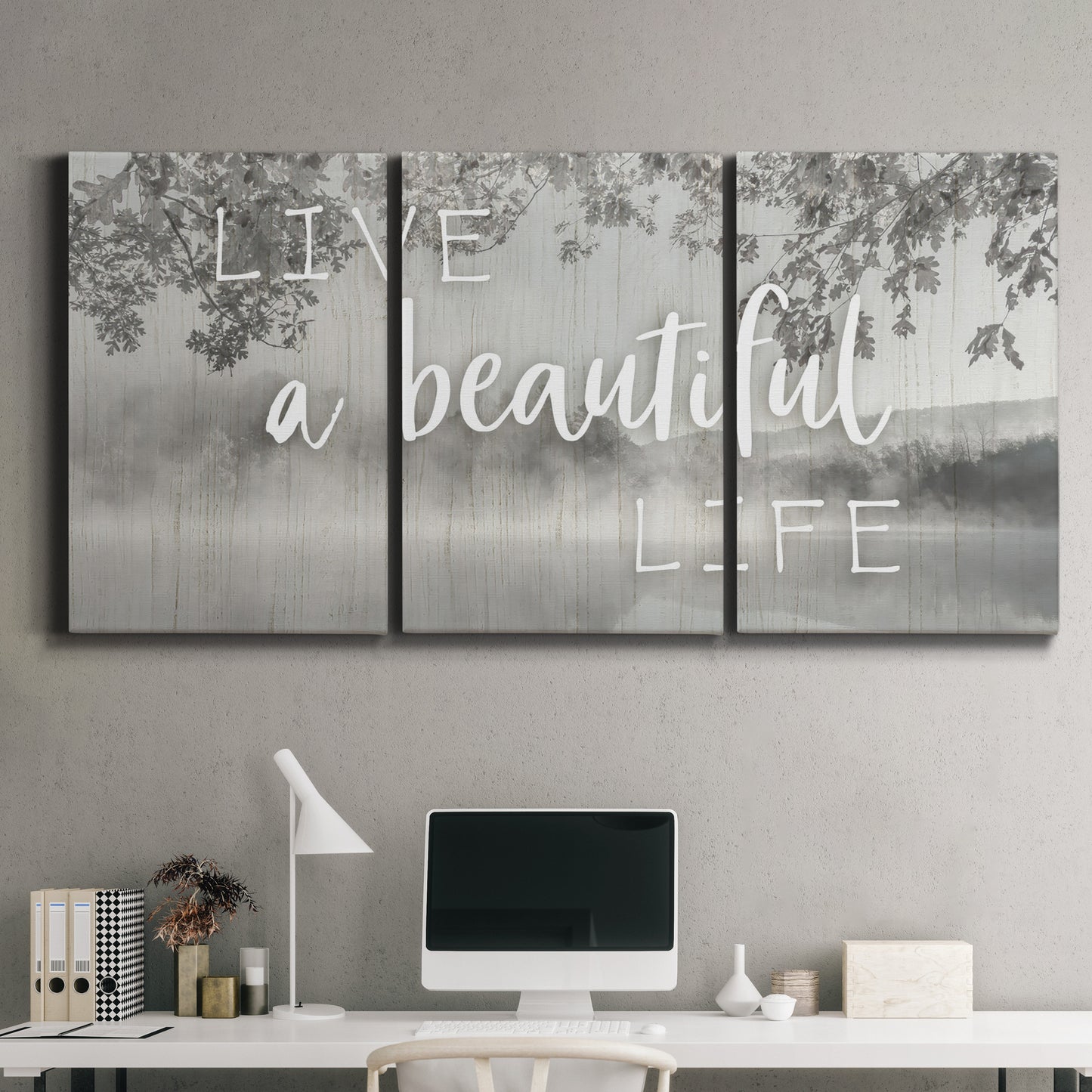 Three-panel canvas wall art featuring uplifting life themed typography, displayed above a desk in a home office.