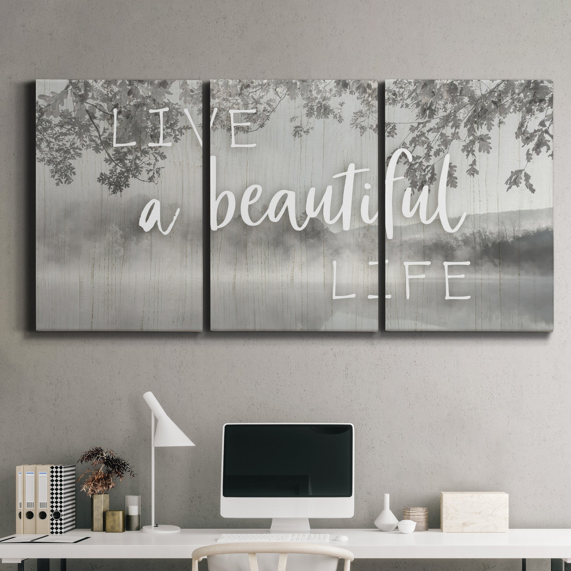 Three-panel canvas wall art featuring uplifting life themed typography, displayed above a desk in a home office.