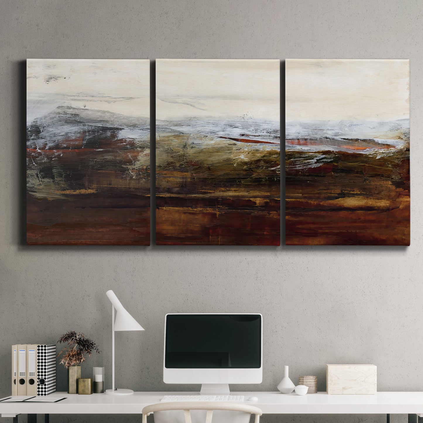 Three-panel canvas wall art featuring rustic abstract landscape exploration, displayed above a desk in a home office.