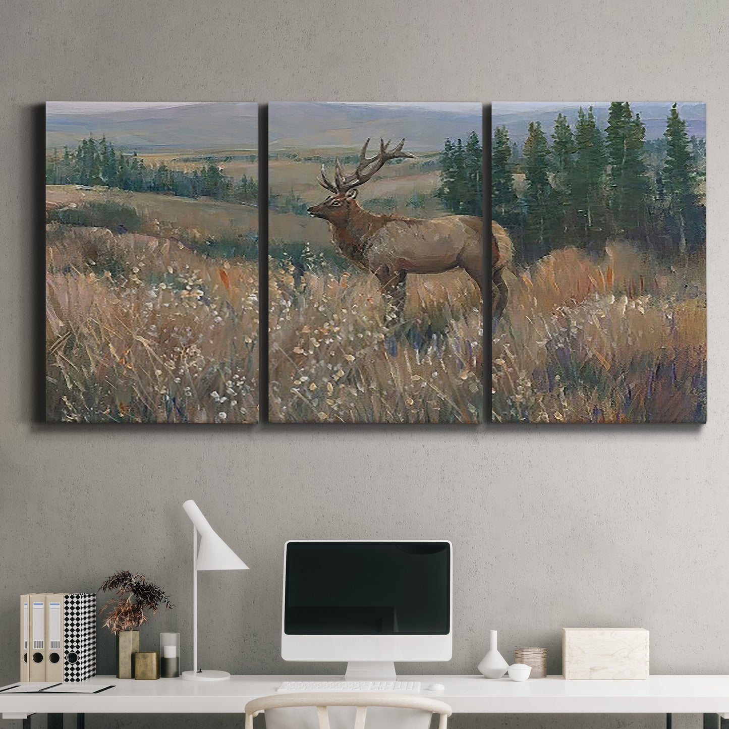 Three-panel canvas wall art featuring western wildlife standing in grassland, displayed above a desk in a home office.