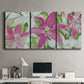 Three-panel canvas wall art featuring pink and white lilies in bloom, displayed above a desk in a home office.