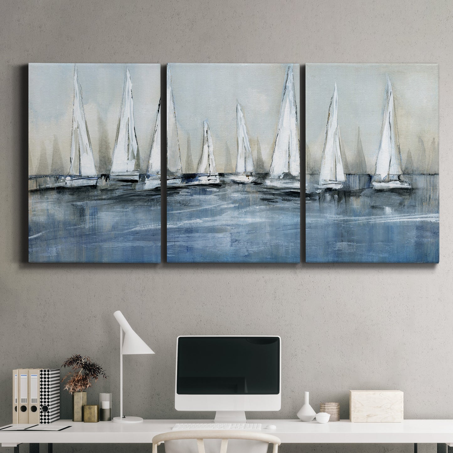 Three-panel canvas wall art featuring still life with pears and grapes, displayed above a desk in a home office.