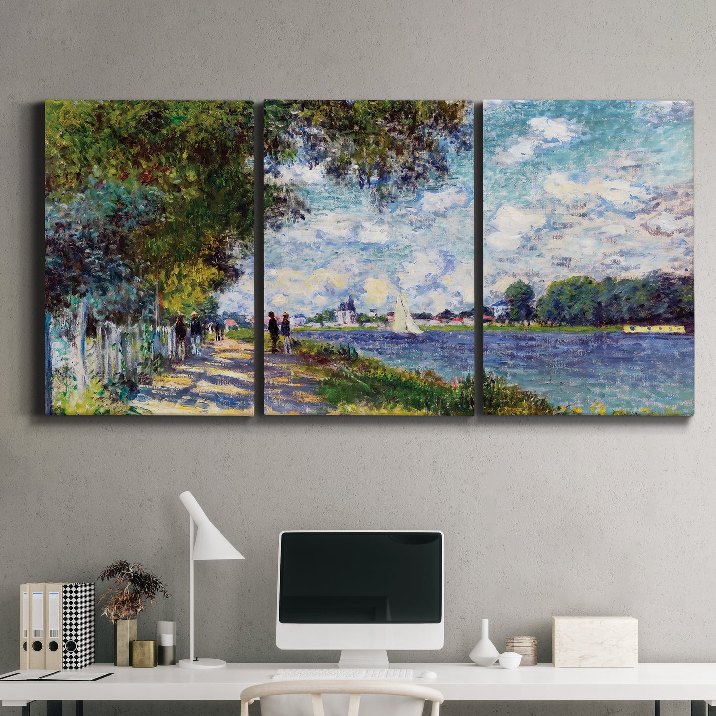 Three-panel canvas wall art featuring river landscape with boats, displayed above a desk in a home office.